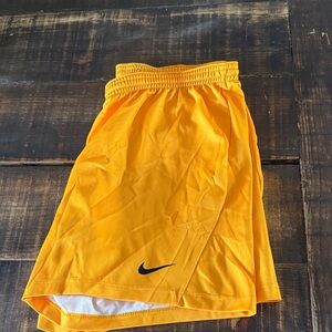 Nike shorts gold
